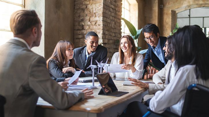 A group of executives reviewing a risk framework assessment